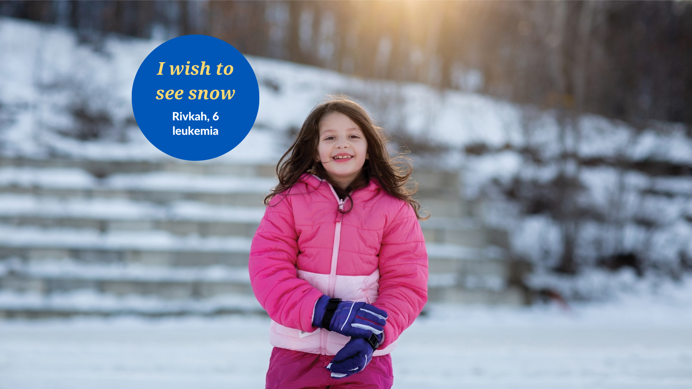 young girl standing in snow