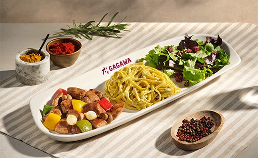 lunch platter with grilled chicken, salad and pasta displayed on a placemat 