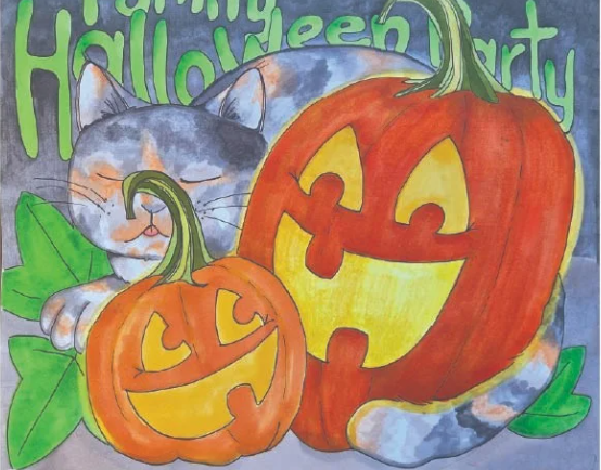 A cat curled up next to two carved pumpkins.