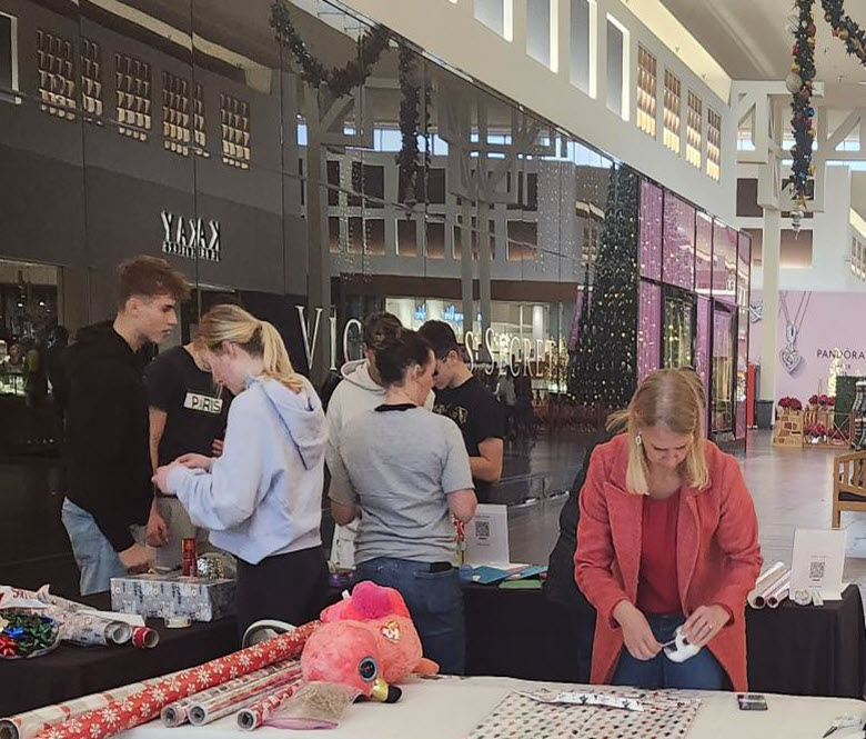 A gift wrapping station inside of the mall.