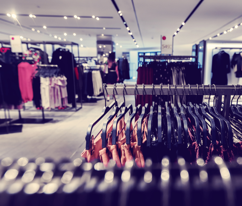 Clothing inside of a department store.
