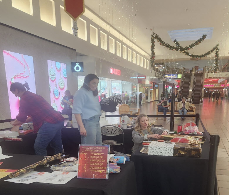 A gift wrapping station inside of the mall.