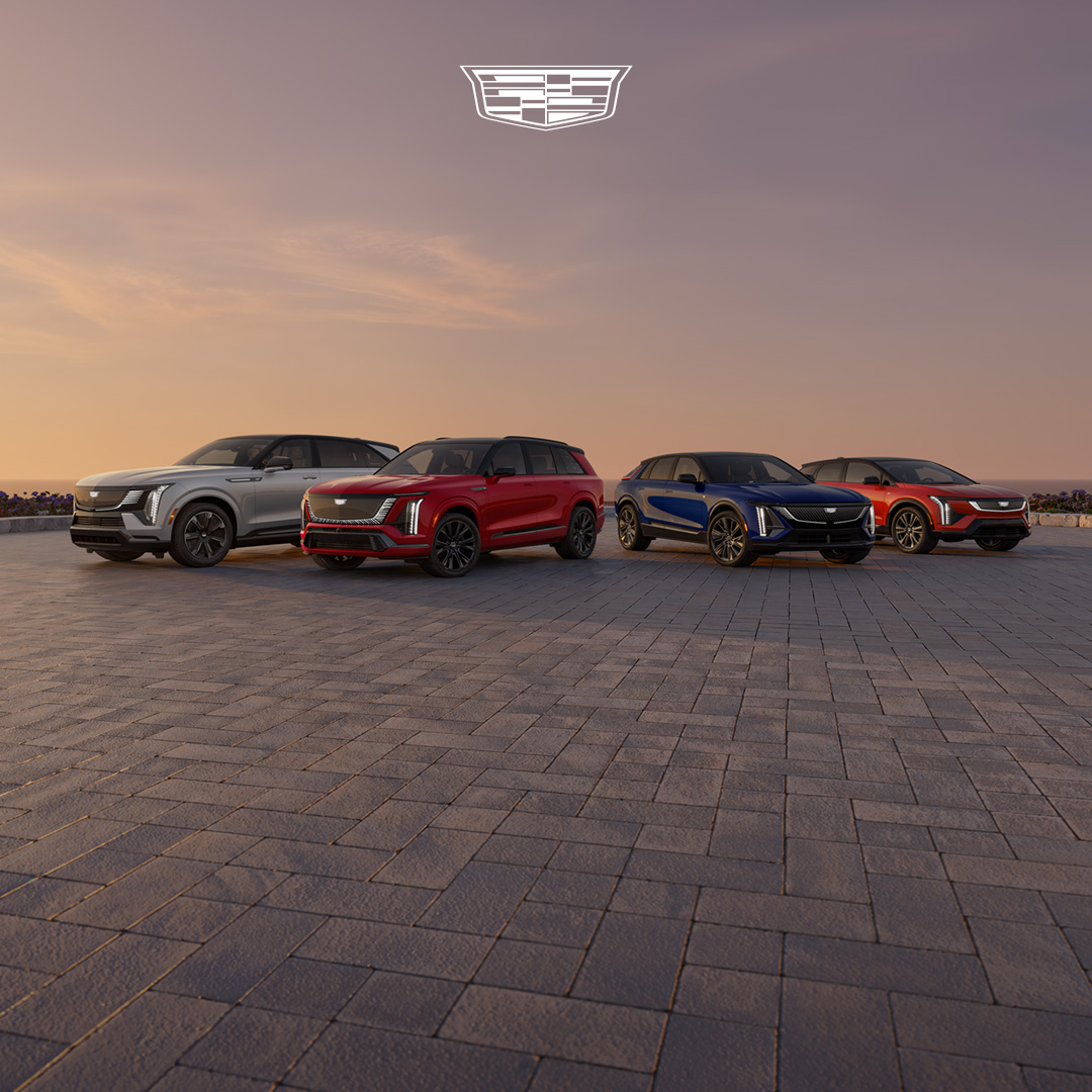 A group of Cadillac cars on pavers