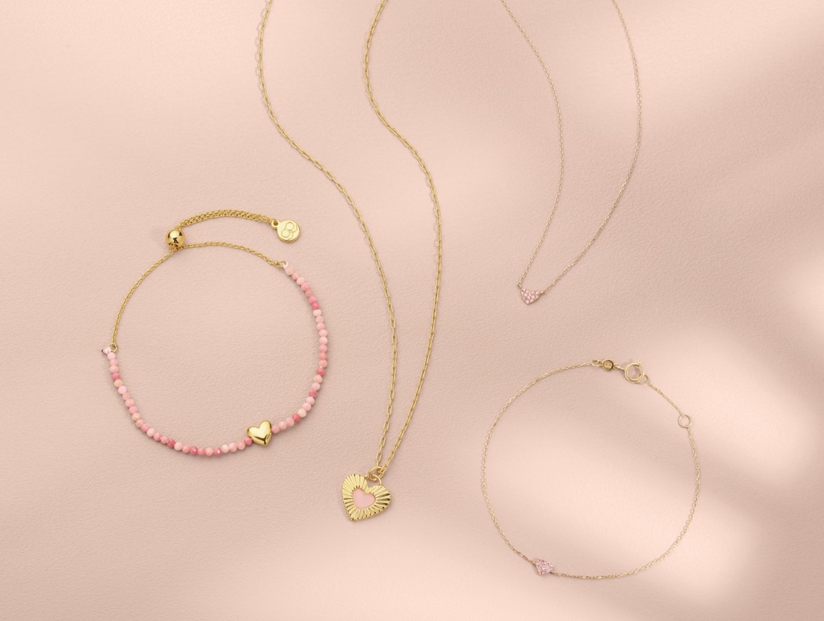 Heart necklace and pink bracelets from Gorjana's Pink Collection