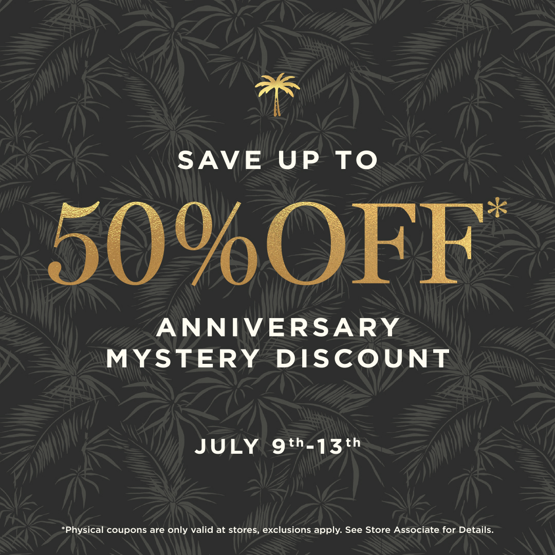 A flyer promoting 50% off at TravisMathew