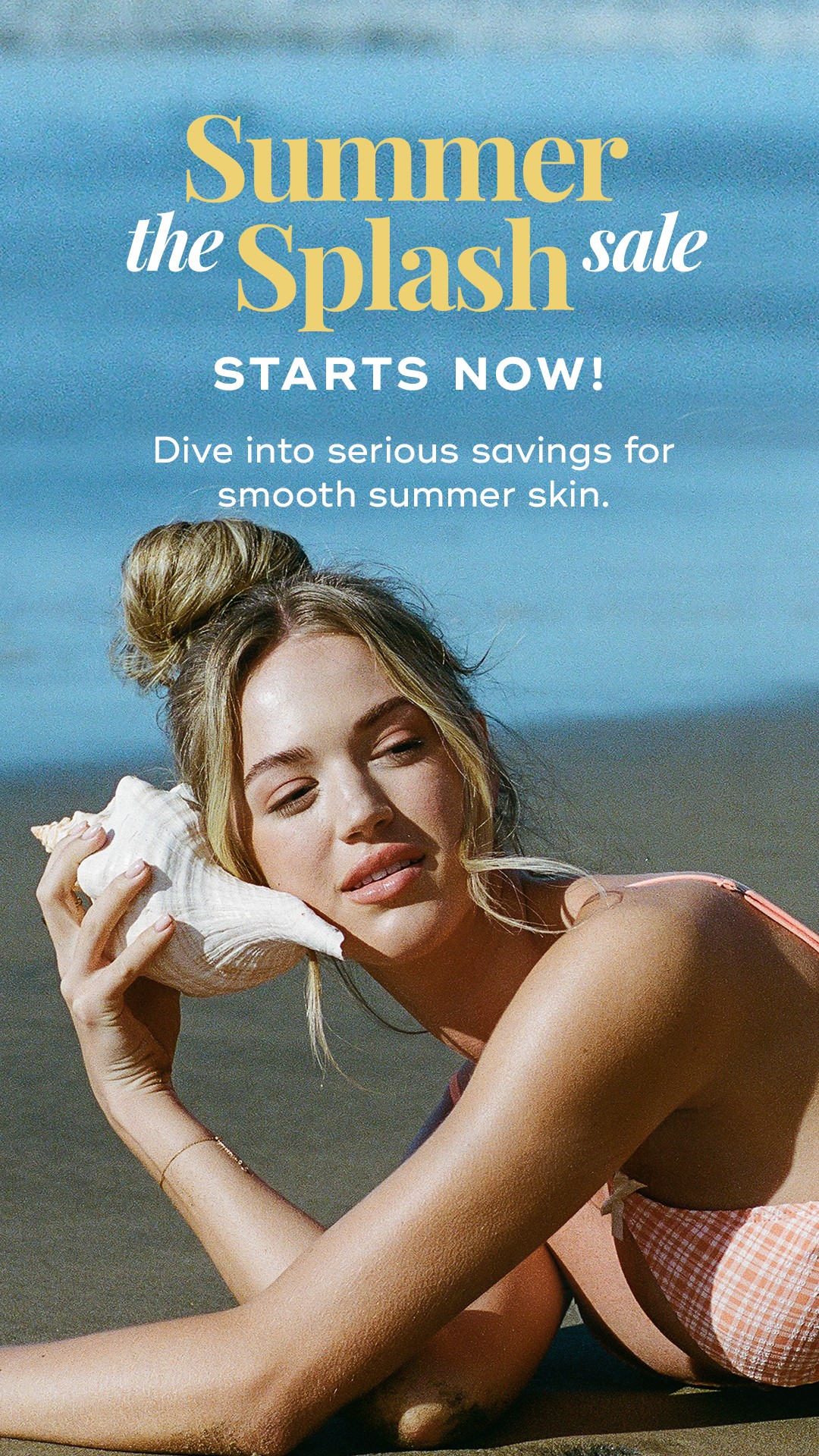A woman lying on the sand in an orange and white bathing suit holding a white conch shell up to her ear promoting Laser Away's Summer Splash Sale