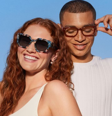 A young woman and young man wearing glasses from Warby Parker