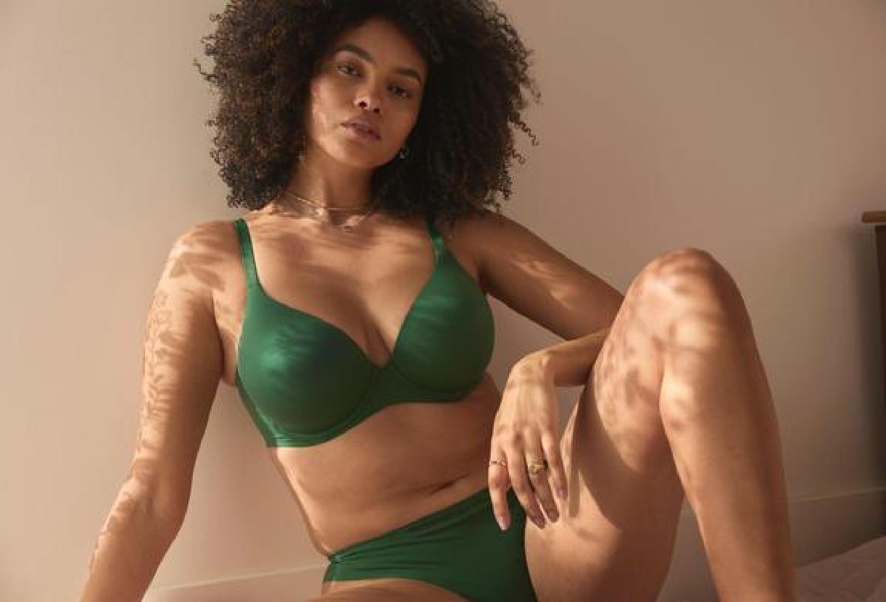 a model wearing a green bra