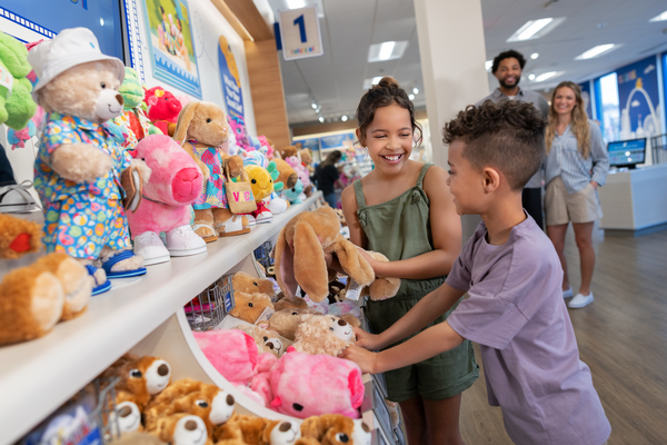 an image of kids playing at a build a bear store