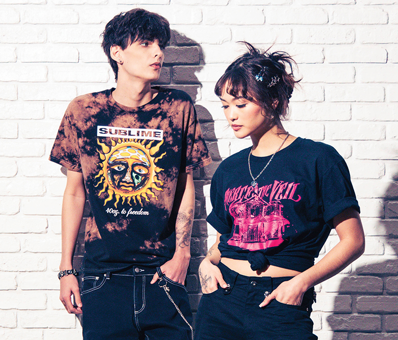 a male wearing a sublime tshirt and jeans and female wearing majestic veil tshirt and jeans