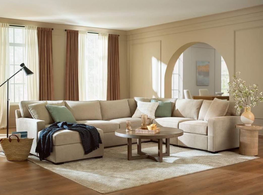 home living room set up with couch, table, lamp and home accessories