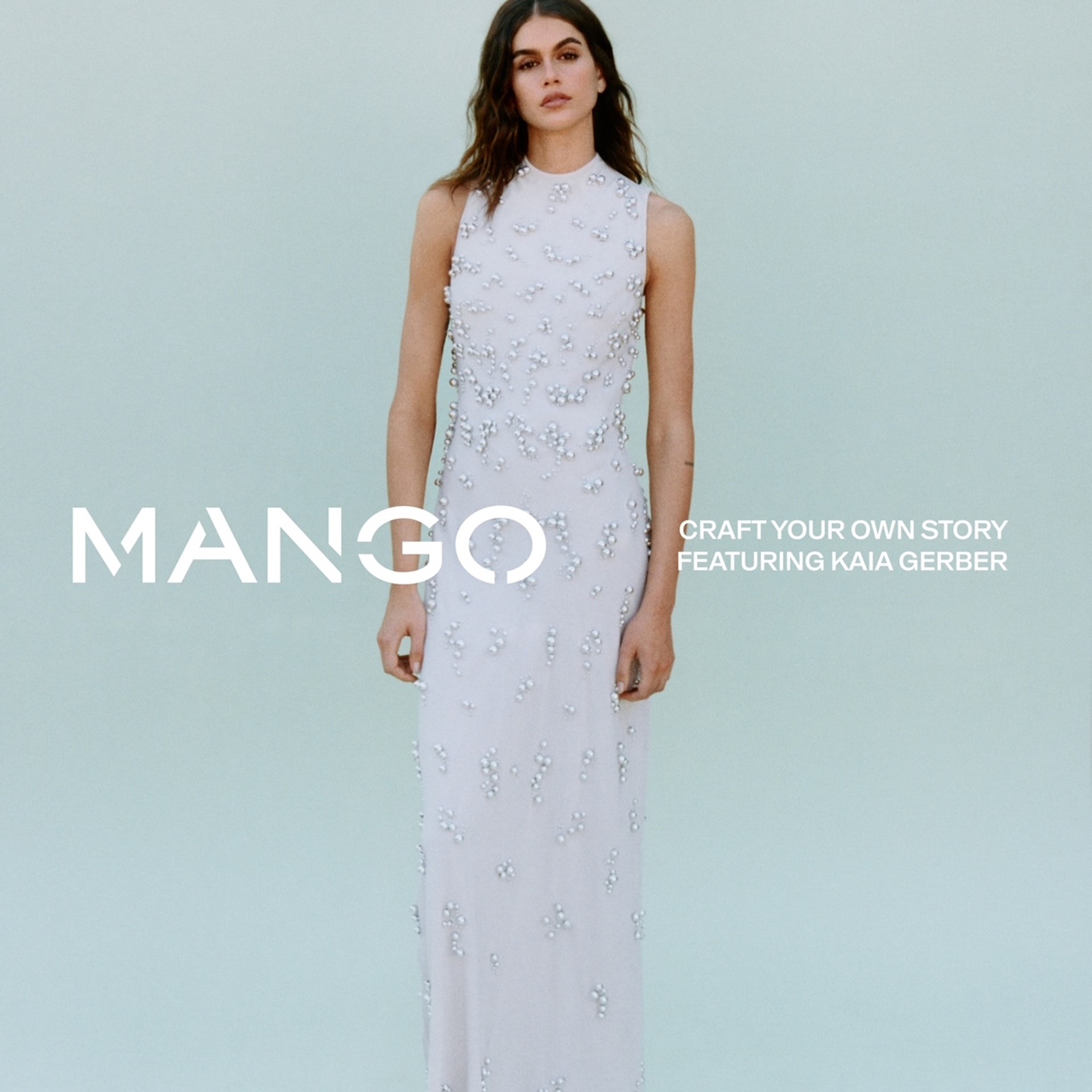 Mango craft your own story featuring Kaia Gerber- wearing a white gown