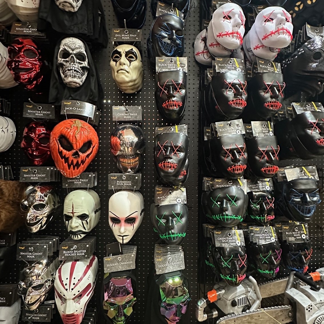 the scary mask wall at Spirit Halloween