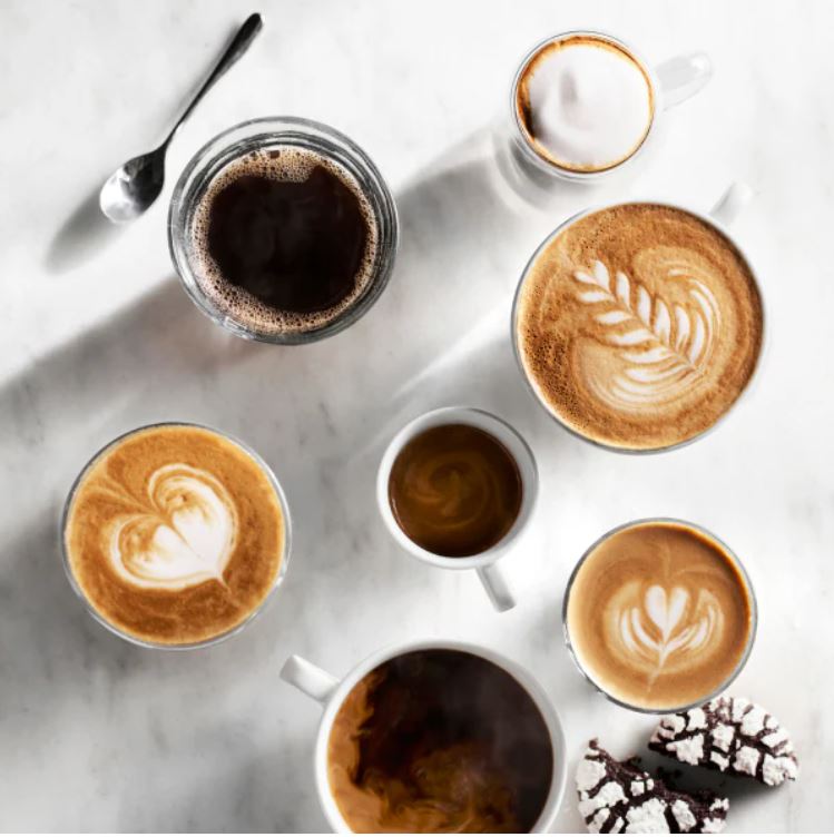 an overhead view of several cups of coffee