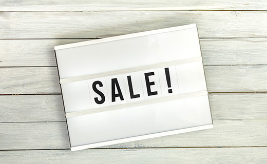Sale sign on white background