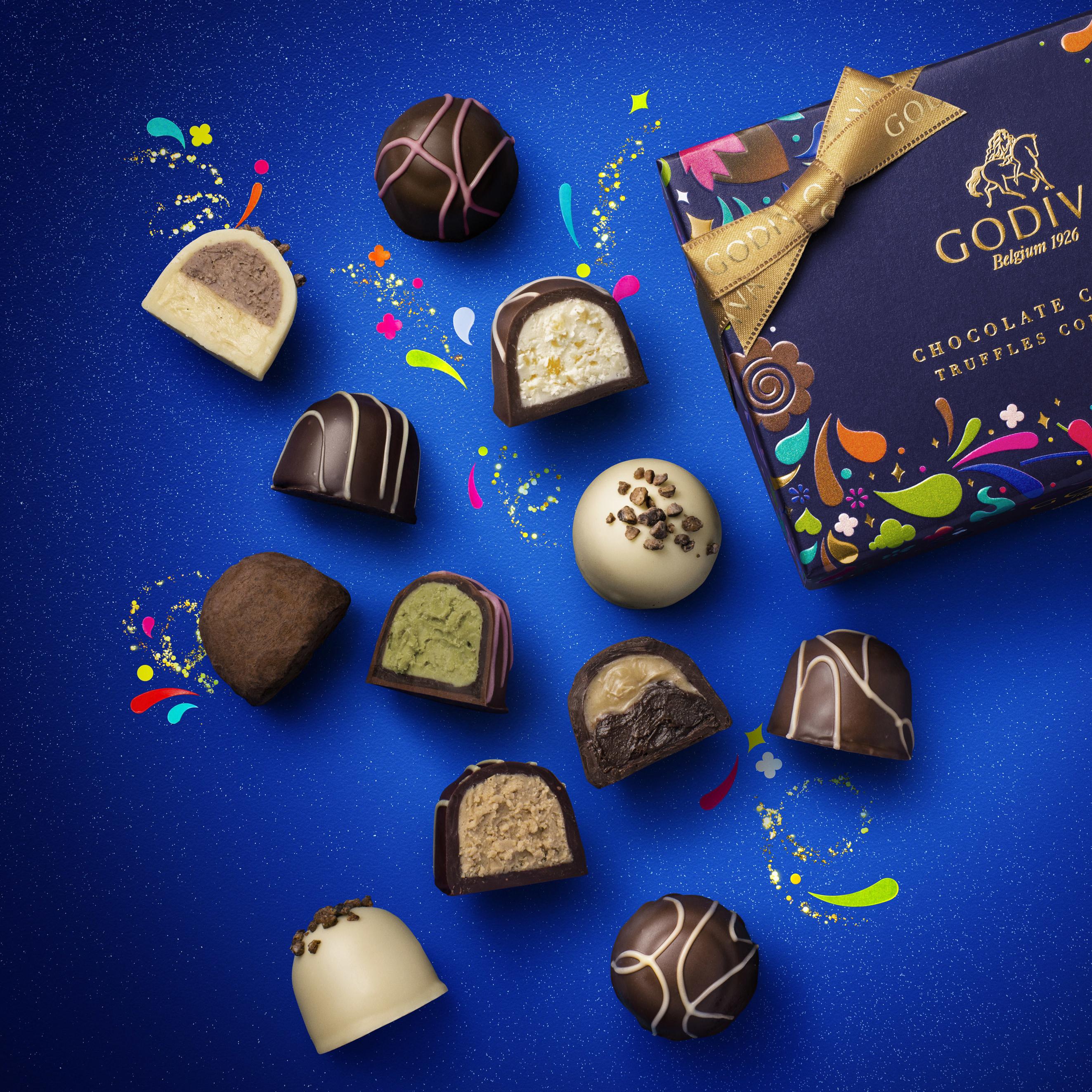 Godiva box of Carnival Truffles and loose truffles shown next to box