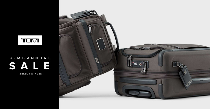 Copy: Tumi logo. Semi-annual sale. Select styles. Image: two Tumi suitcases shown