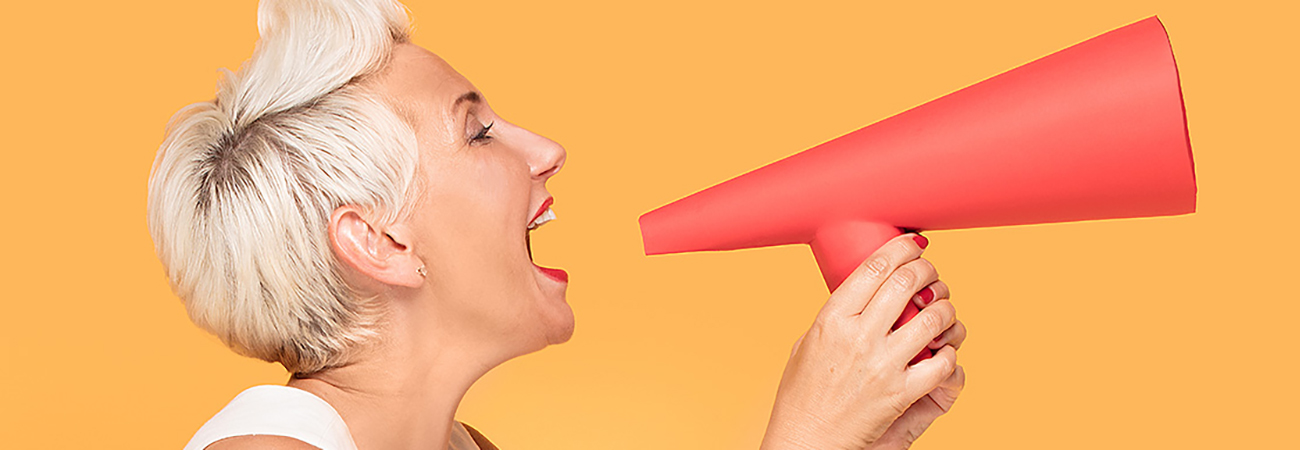 Woman shouting into a megaphone