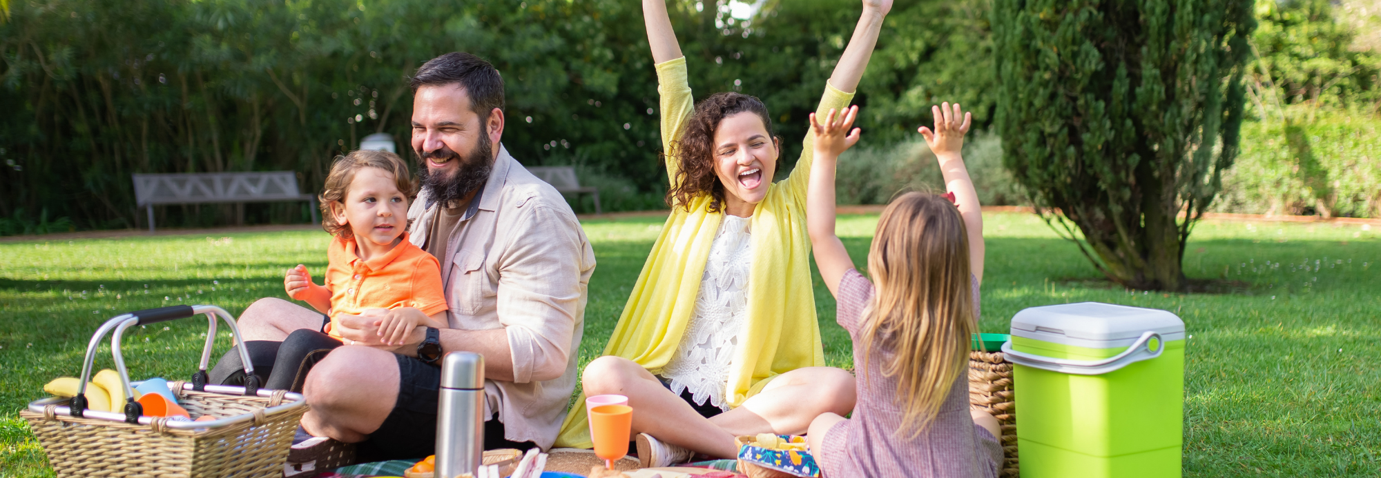 Family having fun at a picnic together.