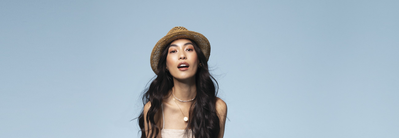 Woman wearing a straw hat 