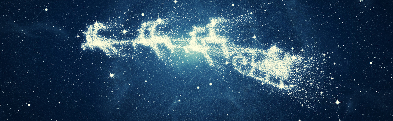 Illustrated silhouette of Santa's sleigh and reindeer rendered in the stars in the night sky
