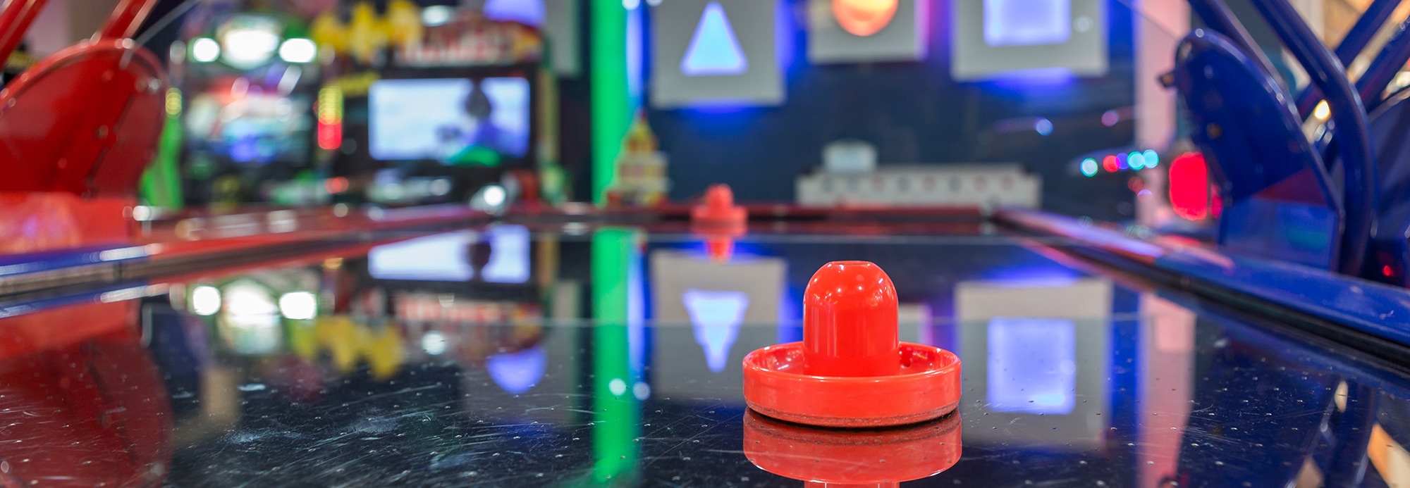 Close up view of an arcade air hockey table