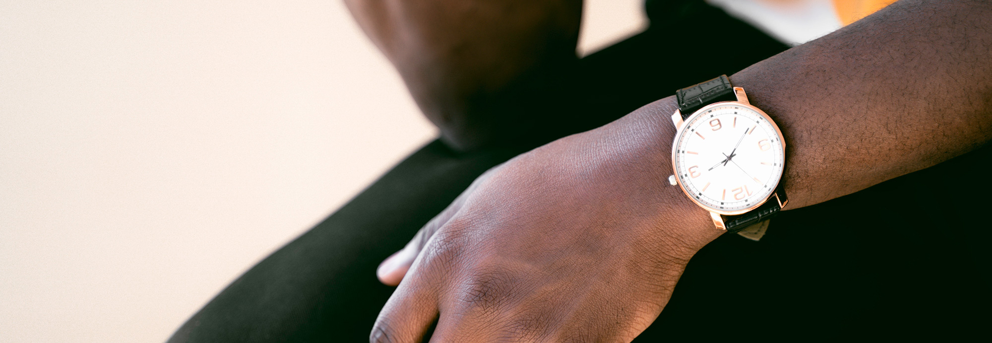 Close-up of a man wearing a watch on his wrist