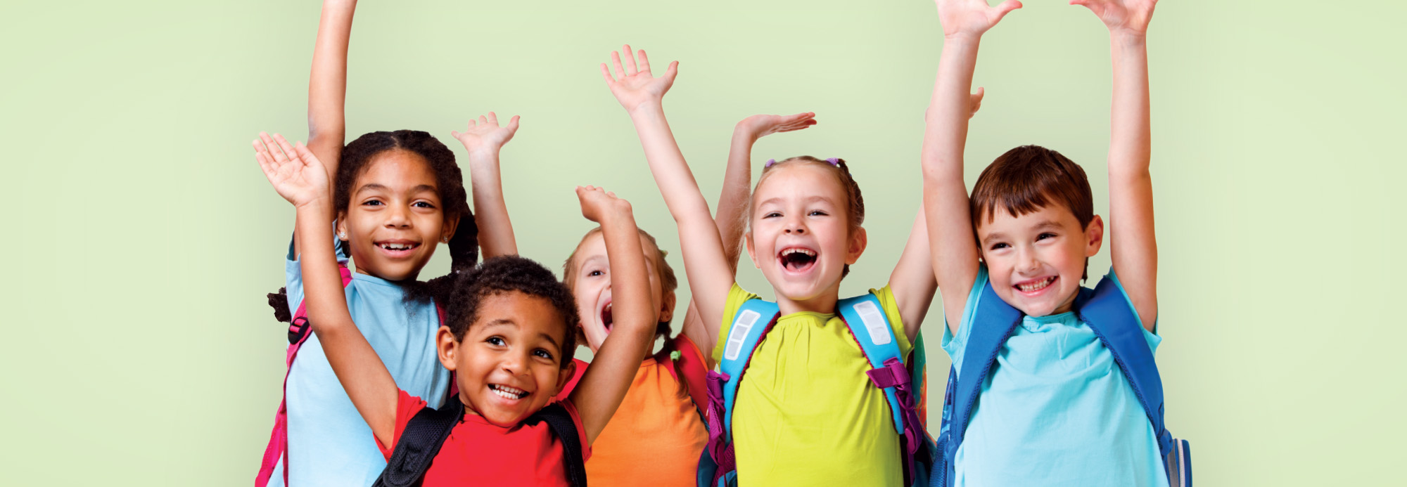 School children posing with their back packs