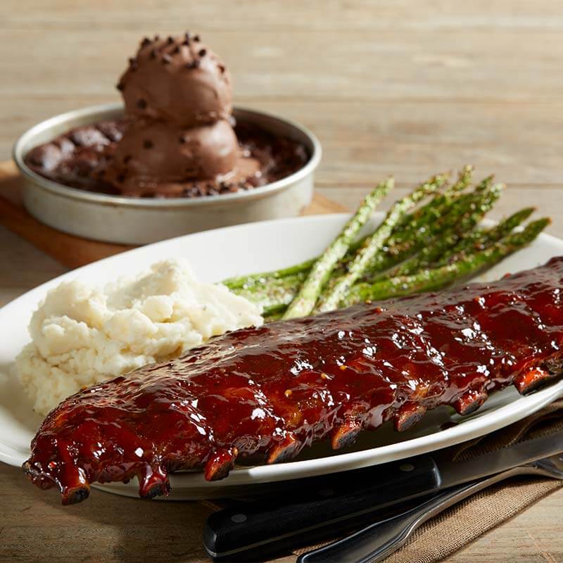 Ribs, asparagus, mashed potatoes, and a "pizookie" (cookie topped with ice cream).