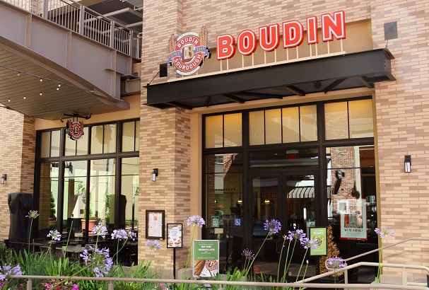 Storefront photo of Boudin at Broadway Plaza showing front patio and entrance doors.