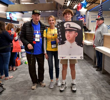 Photo of a family during a recent Honor Flight Parade at Evansville Regional Airport