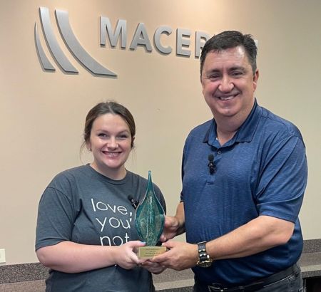 Presenting Nonprofit of the Month award presented to Maddie Mitchell