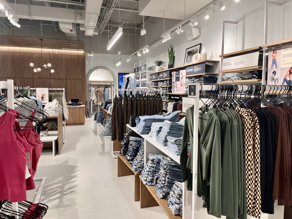 Inside an Abercrombie & Fitch store with bright lighting