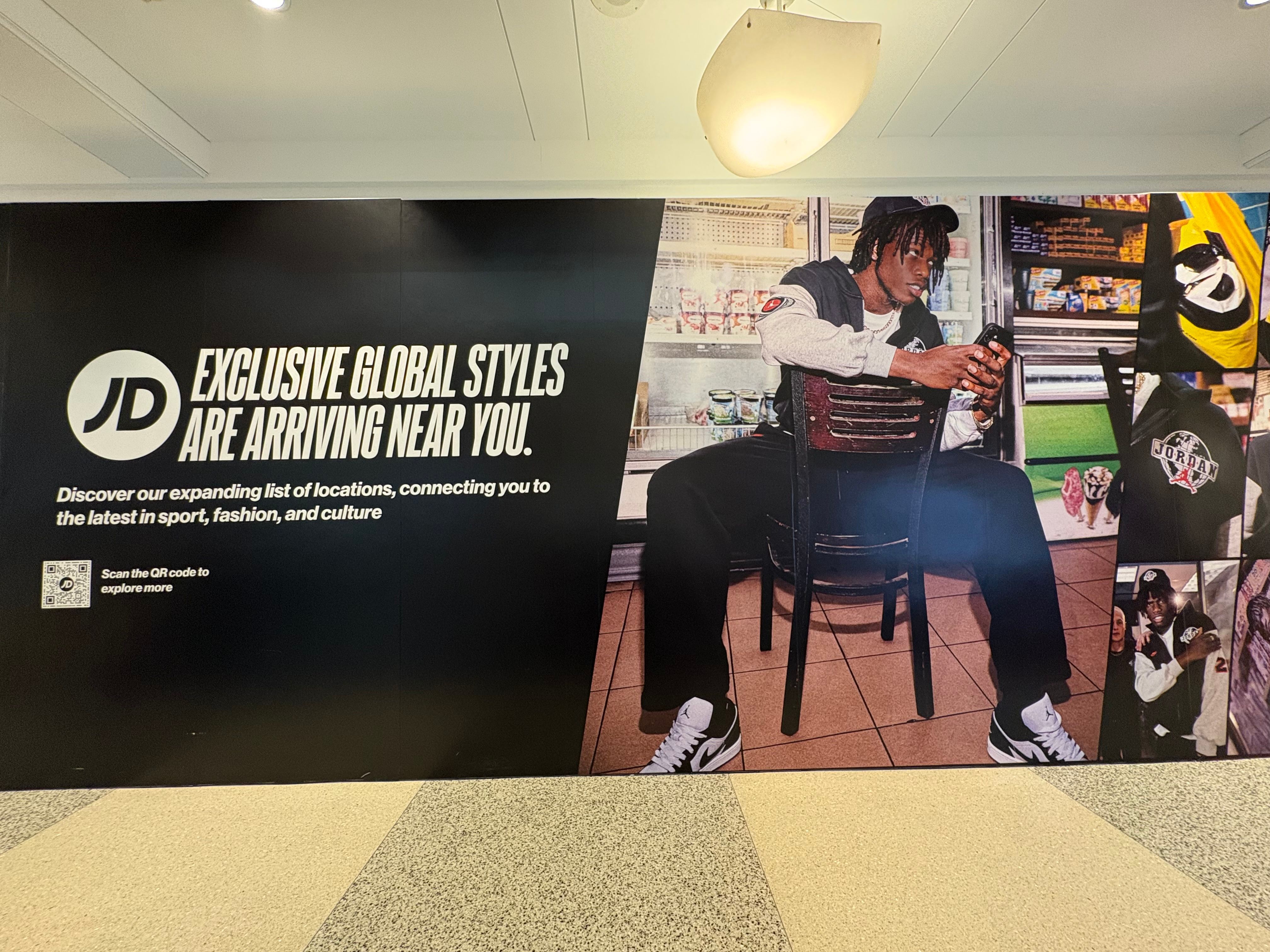 JD Sports branded barricade at Kings Plaza.