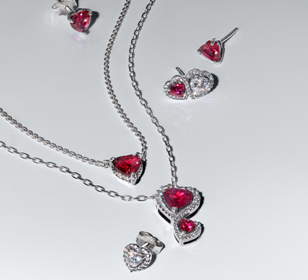 Heart necklaces on silver chains with pink stones