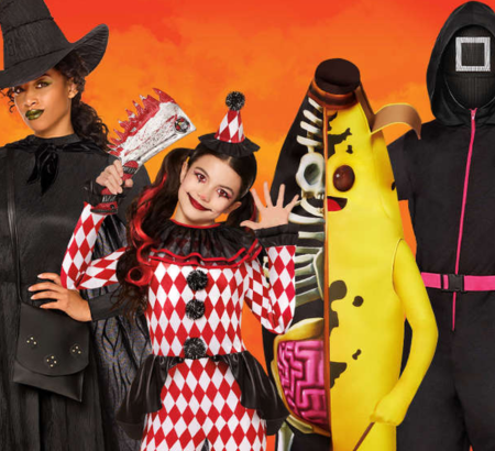 Group of people wearing Halloween costumes and posing.
