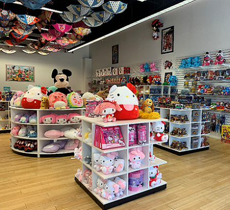 Plush toys on shelves and walls lined with toys.