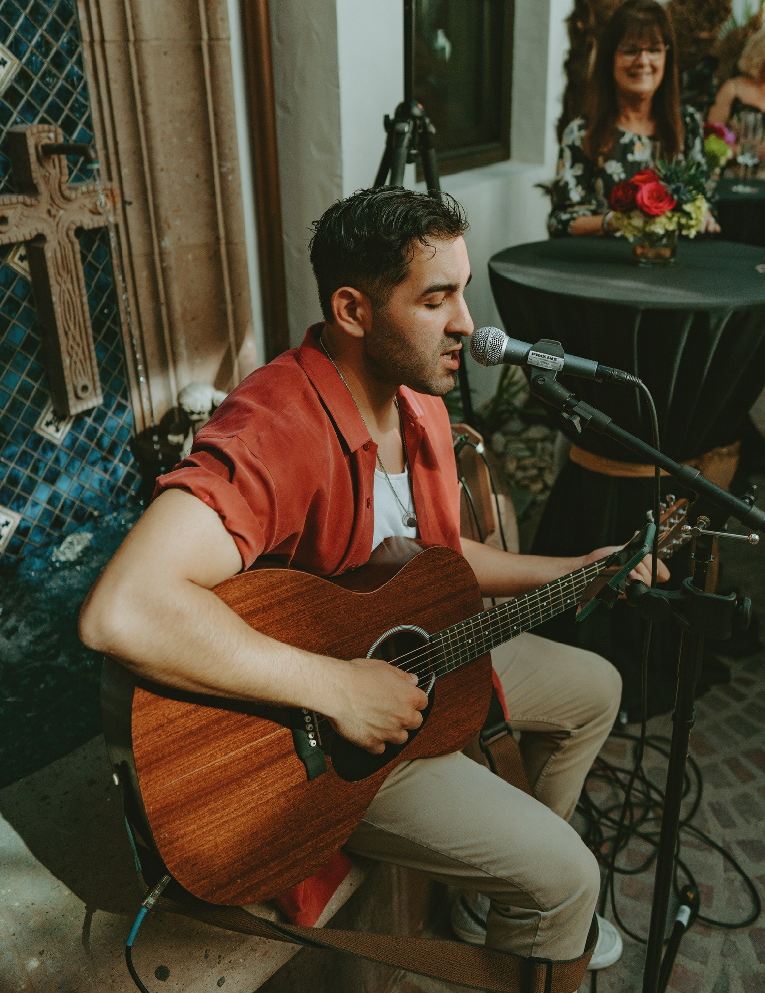 Man playing guitar and singing