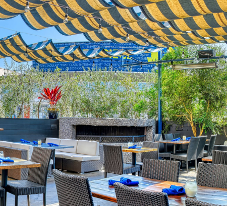Rooftop dining room with yellow and blue accents