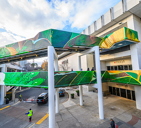 Bridge mural at Tysons with green design of plants