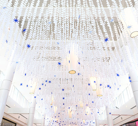 Snowflakes on display as part of the Concourse Hanging Art Exhibit at Tysons Corner Center