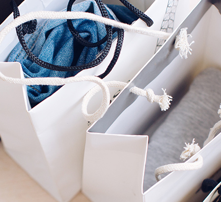 Shopping bags filled with clothing