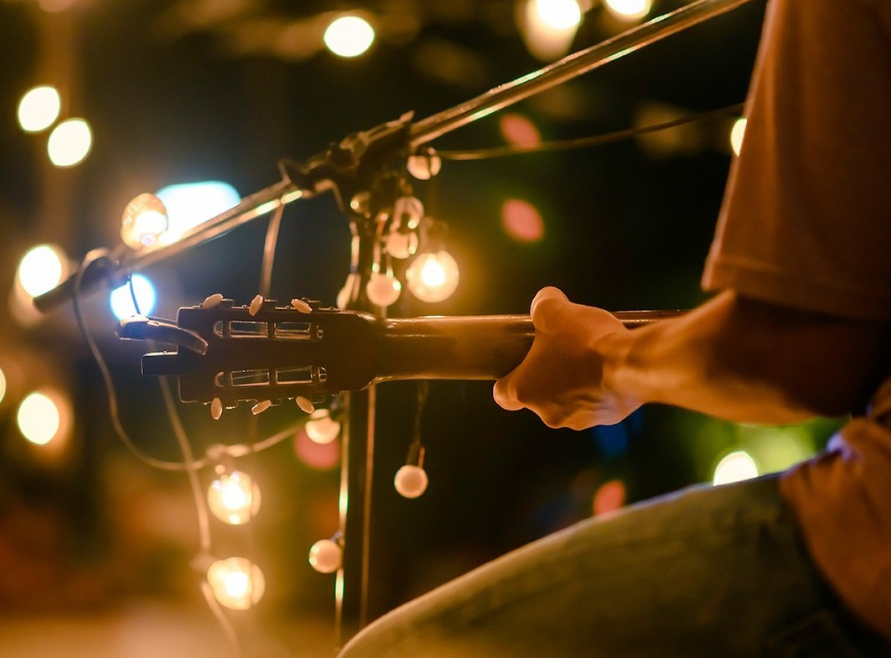 A man playing the guitar