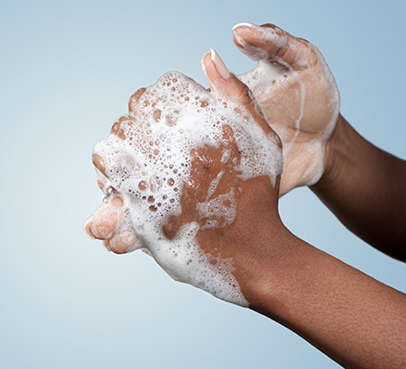Hands washing with soap
