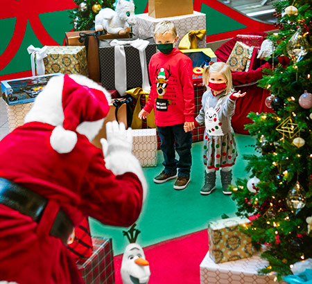 Children getting their photo taken with Santa