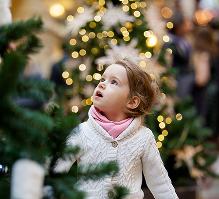 A little girl at a holiday event