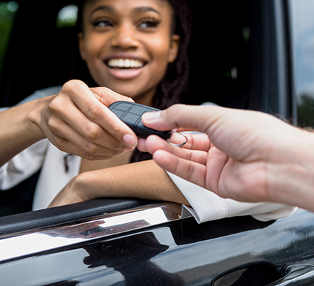 Woman valeting her car