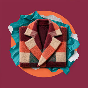 Folded coat with a colorful plaid print