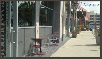 Walkway at Santa Monica Place with dining tables