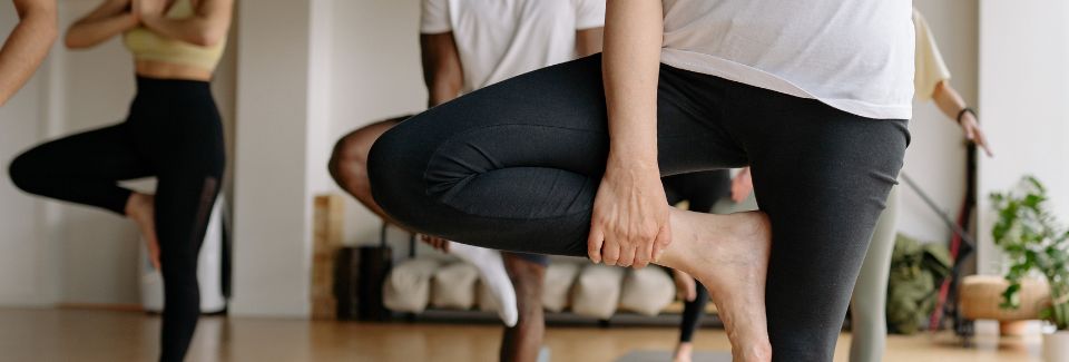 People taking a yoga class.